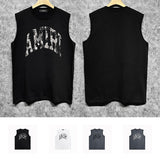 Amiri tank top with cracked curved letter cut outprinting