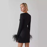 Women Dresses Autumn and Winter Long Sleeve Feather Cuffs Bandage Dress Elegant Dress Party Dress Skirt (Ont0408)
