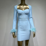 Women Dresses Autumn and Winter Long Sleeve Feather Cuffs Bandage Dress Elegant Dress Party Dress Skirt (Ont0408)