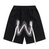 Men Shorts graffiti stitching casual shorts men's and women's loose five-point pants