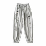 Women Sweatpants Ripped Leisure Sports Pants Loose Close up Ankle-Tied Sweatpants