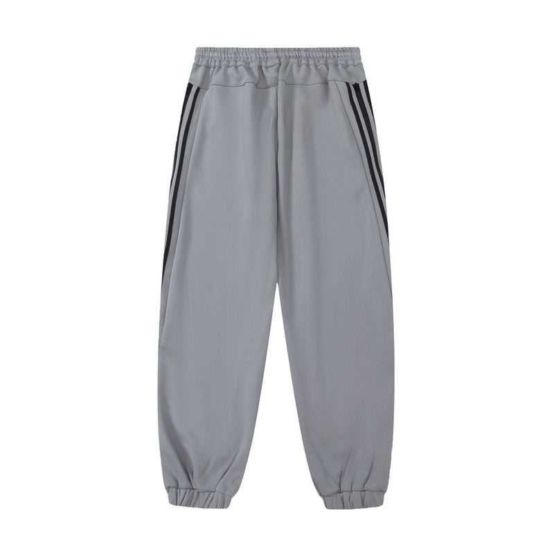 Men Sweatpants Sports Leisure Tappered Trousers with an Elasticated Waist Side Stripe Stitching Loose Zip Trousers